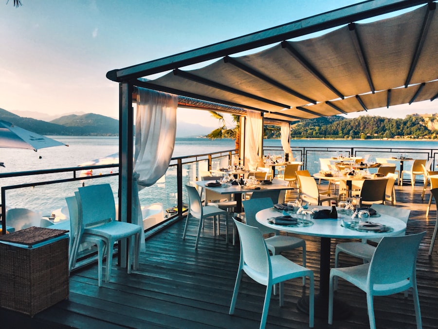 A waterfront restaurant terrace at sunset